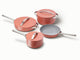Caraway ceramic cookware set in Perracotta with four pans, three matching lids.