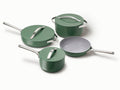 Caraway ceramic cookware set in Sage with four pans, three matching lids.