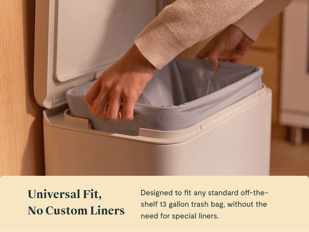 Hands fitting a liner around the rim of an open trash can.