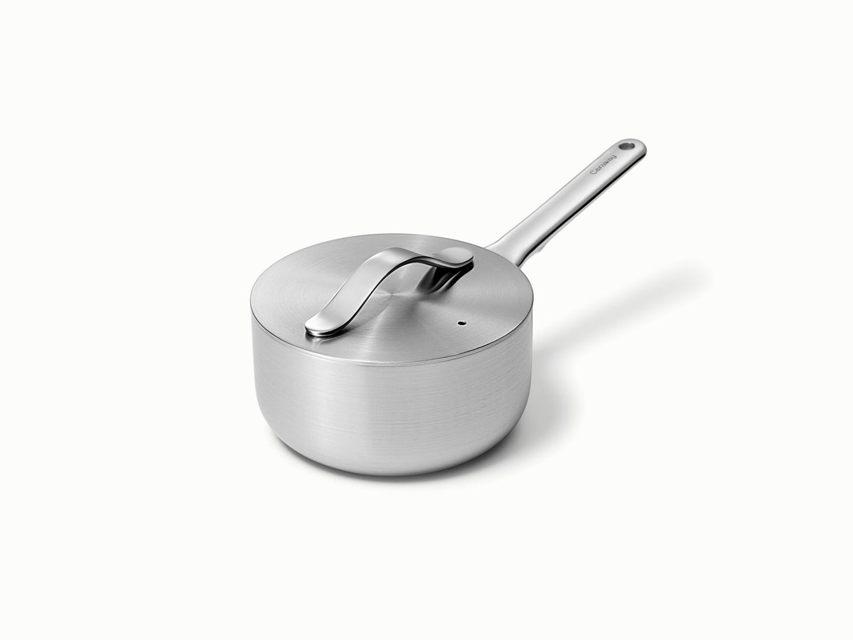 Caraway stainless steel mini sauce pan with a matching lid.