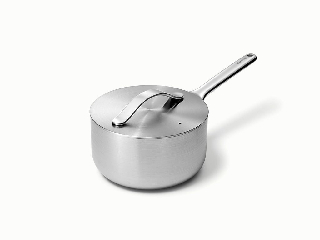 Caraway stainless steel sauce pan with a matching lid.