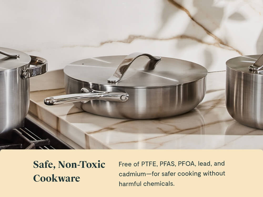 Caraway lidded stainless steel sauté pan on a kitchen counter.