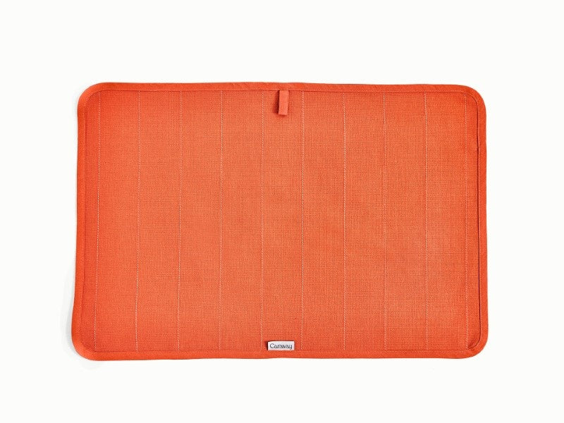 Caraway Perracotta tea towel laid flat to show the fabric and stitching.